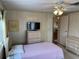 Spacious bedroom with a dresser and views to another room at 863 Baveno Dr, Venice, FL 34285