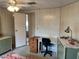Bedroom with a desk, dresser and view of hallway at 863 Baveno Dr, Venice, FL 34285