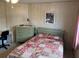 Bedroom with double bed, dresser and workspace at 863 Baveno Dr, Venice, FL 34285