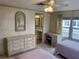 Bedroom with two twin beds and dresser at 863 Baveno Dr, Venice, FL 34285