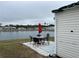 Small patio furniture set overlooking a lake at 863 Baveno Dr, Venice, FL 34285