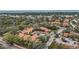 An aerial view showcasing a community's layout, including buildings and parking areas at 958 Sunridge Dr # H3, Sarasota, FL 34234