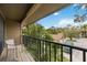 Spacious balcony with view of the community and trees at 958 Sunridge Dr # H3, Sarasota, FL 34234