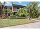 Front view of condo with landscaping and walkway at 958 Sunridge Dr # H3, Sarasota, FL 34234