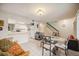 Open concept kitchen and dining area with breakfast bar at 958 Sunridge Dr # H3, Sarasota, FL 34234