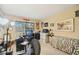 Spacious home office with a large desk and window at 958 Sunridge Dr # H3, Sarasota, FL 34234