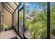 Screened patio with space for grilling and relaxing at 958 Sunridge Dr # H3, Sarasota, FL 34234