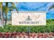 Watercrest community entrance sign with landscaping at 9895 Wingood Dr, Venice, FL 34292