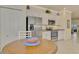 Modern kitchen with stainless steel appliances and granite countertops at 9895 Wingood Dr, Venice, FL 34292