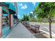 Walkable street with benches and shops at 9895 Wingood Dr, Venice, FL 34292