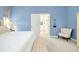 Bedroom with king-size bed and access to en-suite bathroom at 107 Corte Del Rosa, Venice, FL 34285