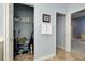 Linen closet with shelving and additional storage at 107 Corte Del Rosa, Venice, FL 34285