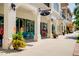 Nice shopping district with various stores and flowers at 107 Corte Del Rosa, Venice, FL 34285
