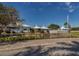 Community clubhouse with pond and fountain at 11053 Barnsley Dr, Venice, FL 34293