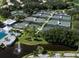 Community tennis courts with pool and fountain at 11053 Barnsley Dr, Venice, FL 34293