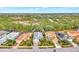 Community overview featuring a row of houses, highlighting one in particular at 12386 Sagewood Dr, Venice, FL 34293