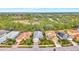Community view showcasing several homes with varying architectural styles at 12386 Sagewood Dr, Venice, FL 34293