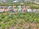 Aerial view of a single Gathering home with backyard at 12386 Sagewood Dr, Venice, FL 34293