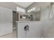 Main bathroom with a large walk-in shower and modern fixtures at 12386 Sagewood Dr, Venice, FL 34293
