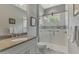 Modern bathroom with a walk-in shower and stylish finishes at 12386 Sagewood Dr, Venice, FL 34293