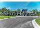 Elegant community center with palm trees at 12386 Sagewood Dr, Venice, FL 34293