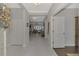 Elegant entryway with tile floors, and views into the living room at 12386 Sagewood Dr, Venice, FL 34293