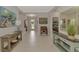 Spacious entryway with consoles and views to other rooms at 12386 Sagewood Dr, Venice, FL 34293