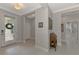 Bright and spacious entryway with tile flooring and views to other rooms at 12386 Sagewood Dr, Venice, FL 34293
