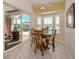 Bright breakfast nook with view of the backyard and sliding glass doors at 1374 Brenner Park Dr, Venice, FL 34292