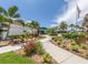 Waterford Sports Club entrance with landscaped walkway at 1374 Brenner Park Dr, Venice, FL 34292