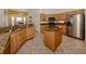 Kitchen with granite countertops and island at 1374 Brenner Park Dr, Venice, FL 34292