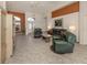 Spacious living room with leather furniture and tile floors at 1374 Brenner Park Dr, Venice, FL 34292