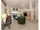 Open living room with lake view and tile floors at 1374 Brenner Park Dr, Venice, FL 34292