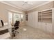 Home office with built-in wall unit and plenty of storage at 1374 Brenner Park Dr, Venice, FL 34292