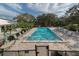 Resort-style pool with plenty of lounge chairs at 1374 Brenner Park Dr, Venice, FL 34292