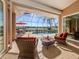 Relaxing screened-in pool and spa area with lake view at 1374 Brenner Park Dr, Venice, FL 34292
