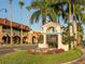 Welcome to Historic Downtown Venice, Florida. Charming entrance with palm trees and flowers at 1374 Brenner Park Dr, Venice, FL 34292