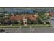 Community clubhouse with Spanish-style architecture at 13836 Karina St, Venice, FL 34293