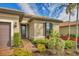 House entrance with a brown door and brick walkway at 13836 Karina St, Venice, FL 34293