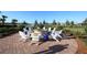 Relaxing fire pit area with comfortable seating at 13836 Karina St, Venice, FL 34293