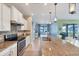 Bright kitchen with stainless steel appliances and an island at 13836 Karina St, Venice, FL 34293