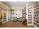 Community library with comfortable seating and bookshelves at 13836 Karina St, Venice, FL 34293