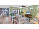Living room with light beige sofa and green walls at 13836 Karina St, Venice, FL 34293
