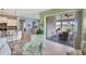 Living area with access to the screened patio at 13836 Karina St, Venice, FL 34293