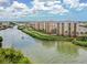 Waterfront community with lush landscaping and boats at 157 Tampa E Ave # 407, Venice, FL 34285