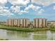 Luxury condos situated on the waterfront with boats at 157 Tampa E Ave # 407, Venice, FL 34285