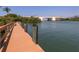 Waterfront dock with a bench and tranquil views at 157 Tampa E Ave # 407, Venice, FL 34285