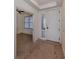 Bright entryway with tile flooring and access to an office at 157 Tampa E Ave # 407, Venice, FL 34285