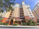 Attractive multi-story building with balconies and landscaping at 157 Tampa E Ave # 407, Venice, FL 34285