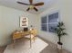 Bright home office featuring a wood desk and chair at 157 Tampa E Ave # 407, Venice, FL 34285